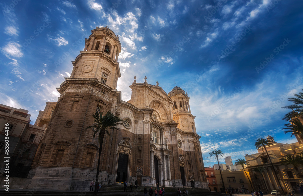 Cadiz cathedral of andalucia travel destination with cloudy blue sky on background