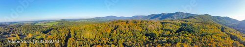 Autumn time colorful beechwood of Jizera Mountains from above