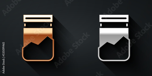 Gold and silver Plastic bag of drug icon isolated on black background. Health danger. Long shadow style. Vector