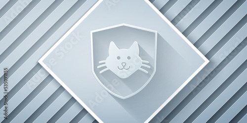 Paper cut Animal health insurance icon isolated on grey background. Pet protection concept. Dog or cat paw print. Paper art style. Vector