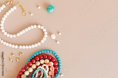 Jewelry making flatlay with semi-precious stone beads and tools. Handmade jewelry, small business, hobby concept photo