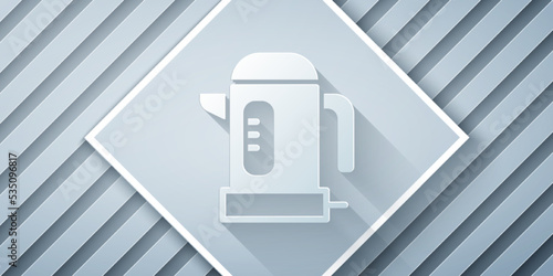 Paper cut Electric kettle icon isolated on grey background. Teapot icon. Paper art style. Vector