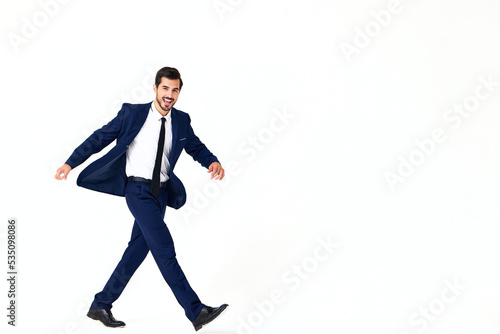 Man business smile with teeth in costume running and jumping flying up open mouth happiness and surprise full-length on white isolated background copy space  © SHOTPRIME STUDIO