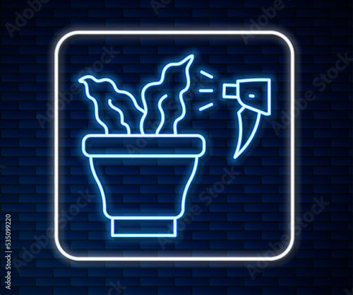 Glowing neon line Spraying a house plant with a spray gun icon isolated on brick wall background. Moistening of foliage. Care for home flowers. Vector