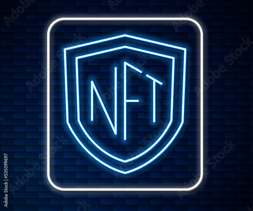 Glowing neon line NFT shield icon isolated on brick wall background. Non fungible token. Digital crypto art concept. Vector