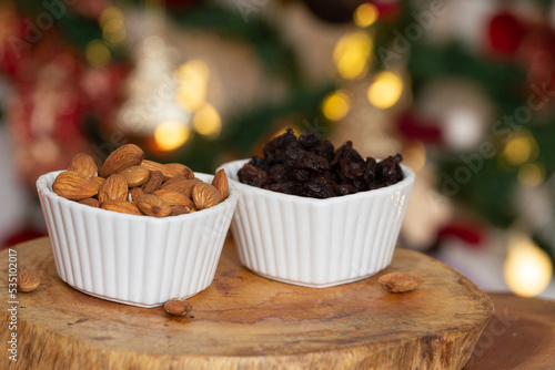 bowl full of almonds and raisins - Christmas time