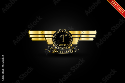 1st anniversary golden gold logo with gold ring and ribbon isolated on black background, vector design for celebration.