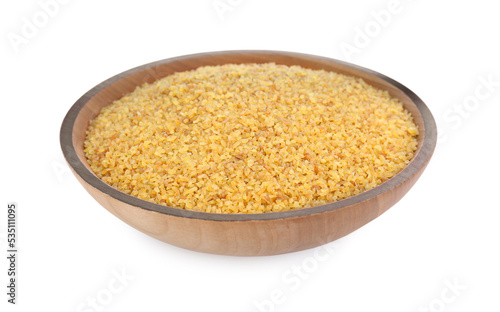 Wooden bowl with uncooked bulgur isolated on white