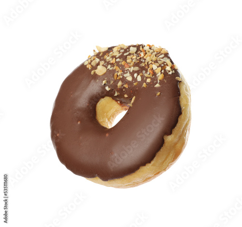 Sweet tasty glazed donut decorated with nuts isolated on white
