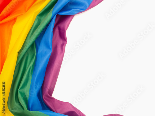 The rainbow flag or LGBT is on a white background with copy space for text