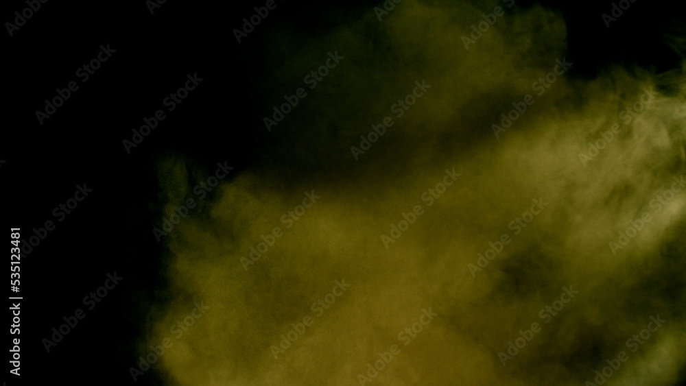 Scene glowing yellow smoke. Atmospheric smoke, abstract color background, close-up. Royalty high-quality free stock of Vibrant colors spectrum. Yellow mist or smog moves on black background