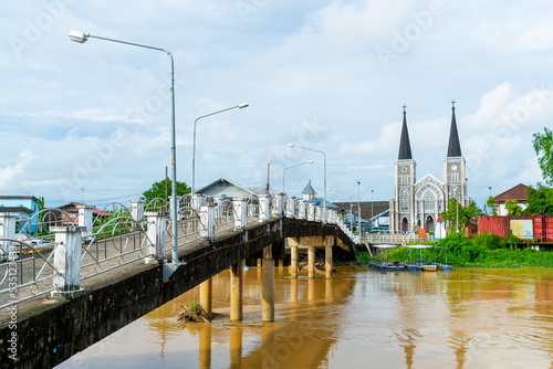 Cathedral of the Immaculate Conception with Niramon bridge at Chanthaburi in Thailand photo