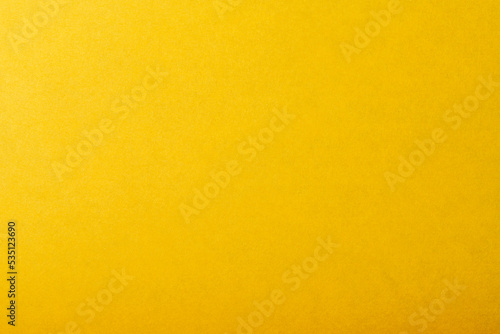 質感のある黄色い紙の背景テクスチャー