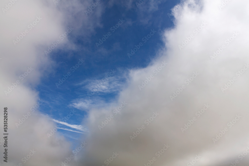 Cumulus clouds in a blue sky for background and layer