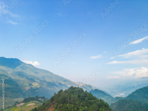 Aerial view of golden rice terraces at Mu cang chai town near Sapa city  north of Vietnam. Beautiful terraced rice field in harvest season in Yen Bai  Vietnam