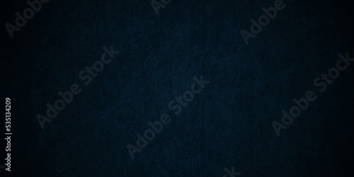 Dark blue stone grunge concrete cement blackboard chalkboard wall floor texture. Black anthracite dark blue grunge old texture panorama backdrop background. 