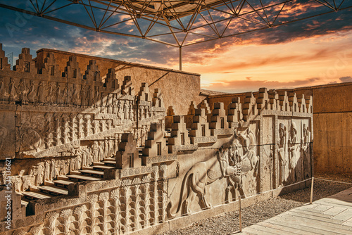 Mesmerizing sunset light over the Bas-reliefs of Ancient Persepolis in Iran