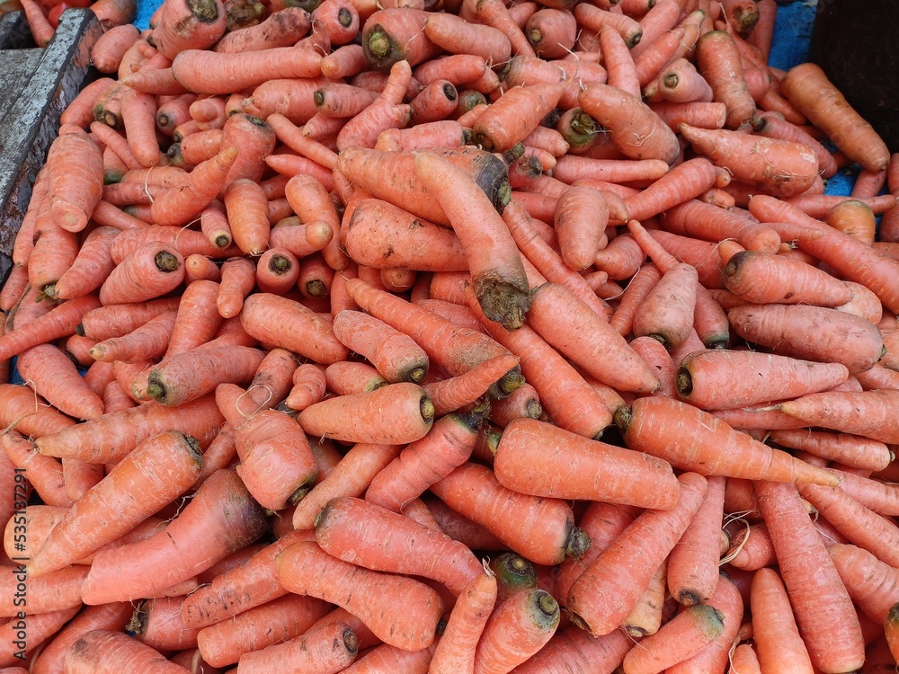 pile of carrots peddled in the market pile of carrots peddled in the market