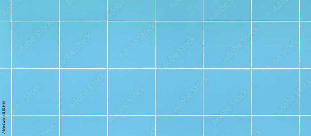 Empty square ceramic tile wall for mockup product display..