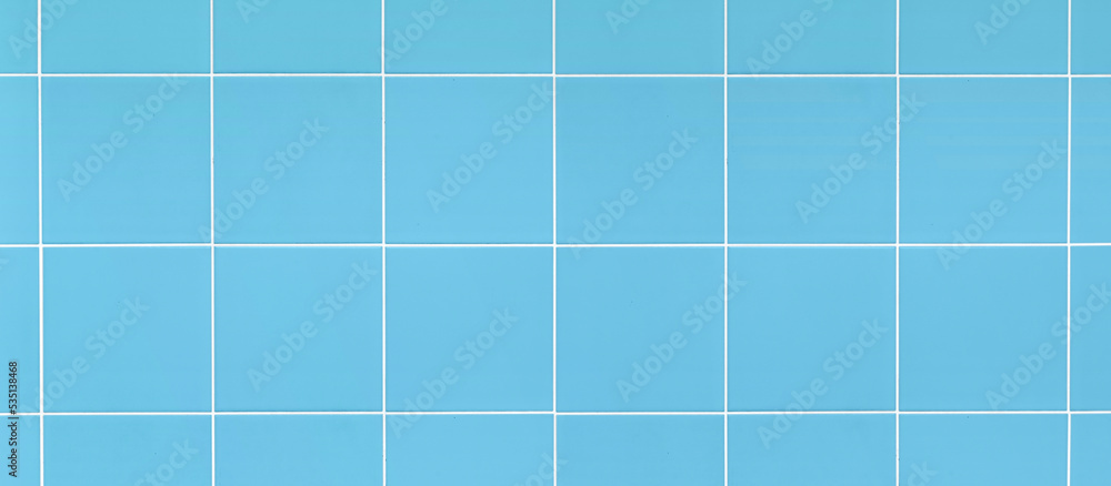 Empty square ceramic tile wall for mockup product display.. Empty square ceramic tile wall for mockup product display..