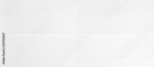 Empty square ceramic tile wall for mockup product display..