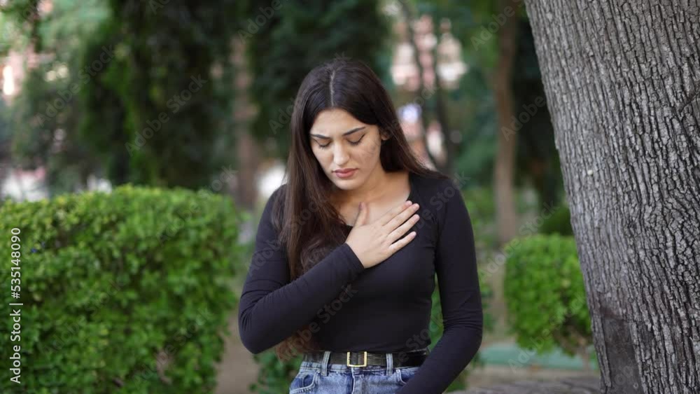 Pressure in the chest. Portrait Of A Young Woman Suffering From Chest Pain Pressure in the chest. Portrait Of A Young Woman Suffering From Chest Pain