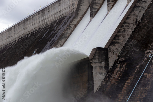 Water flowing over floodgates of a dam at Khun Dan Prakan Chon  Nakhon Nayok Province  Thailand