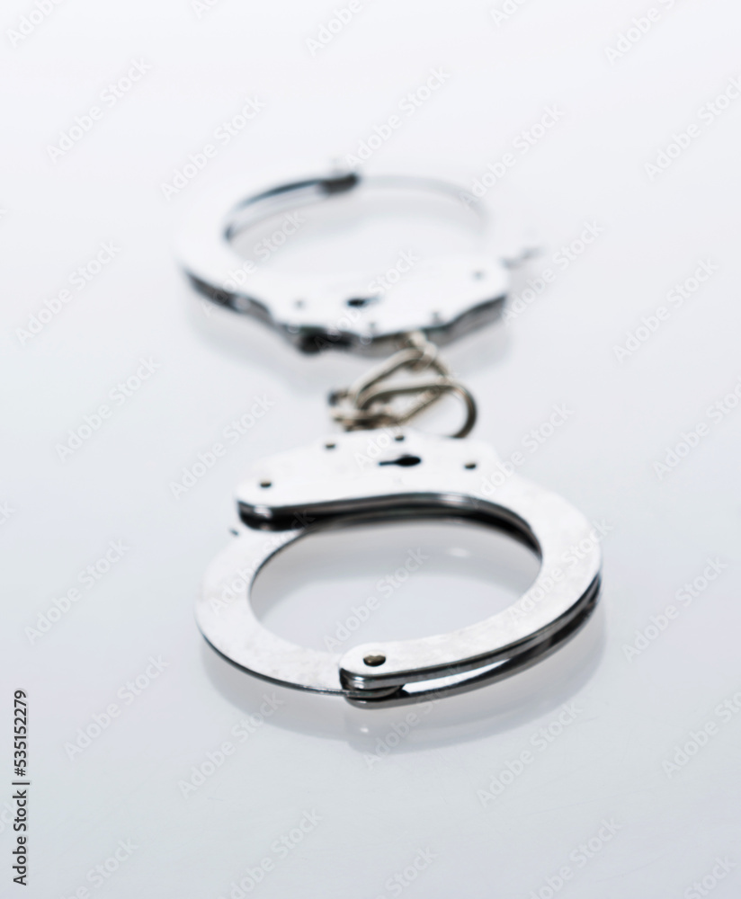 Handcuffs isolated on white background Handcuffs isolated on white background