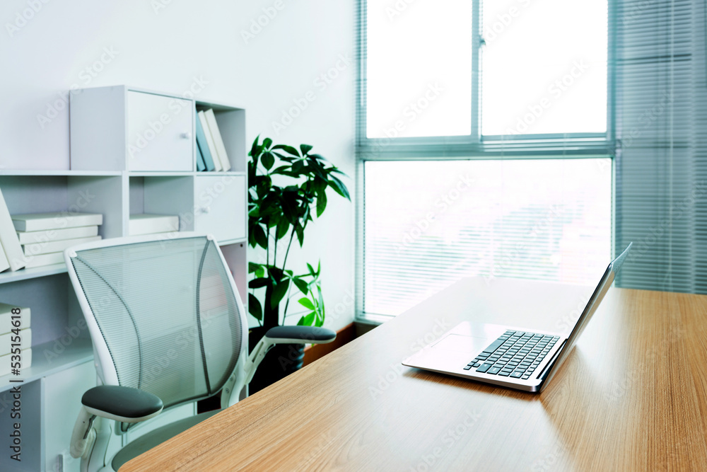 Modern workspace with computer and chair Modern workspace with computer and chair