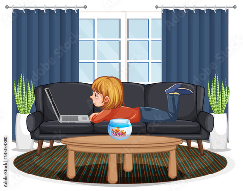 A girl browsing internet on laptop at home