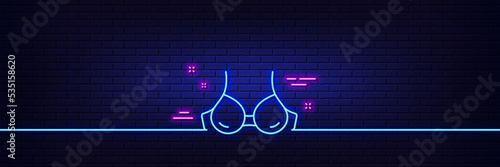 Neon light glow effect. Bra brassiere line icon. Breast lingerie sign. Women chest underwear symbol. 3d line neon glow icon. Brick wall banner. Bra outline. Vector