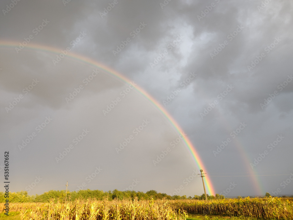 Natural rainbow after the rain in Maramures county, Romania Natural rainbow after the rain in Maramures county, Romania