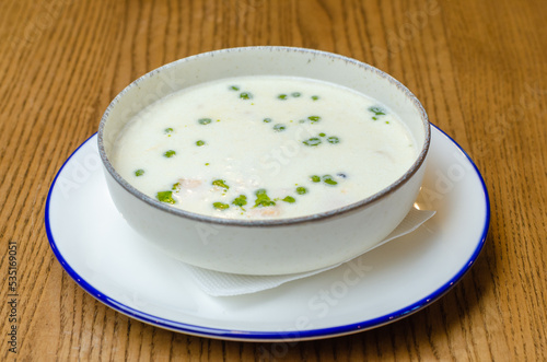 white cream soup with greens