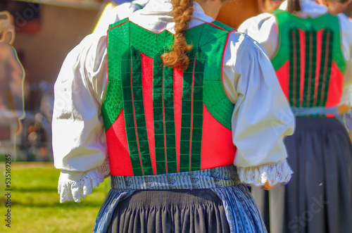 Folklore costumes of Val Gardena. South Tyrol, Italy photo