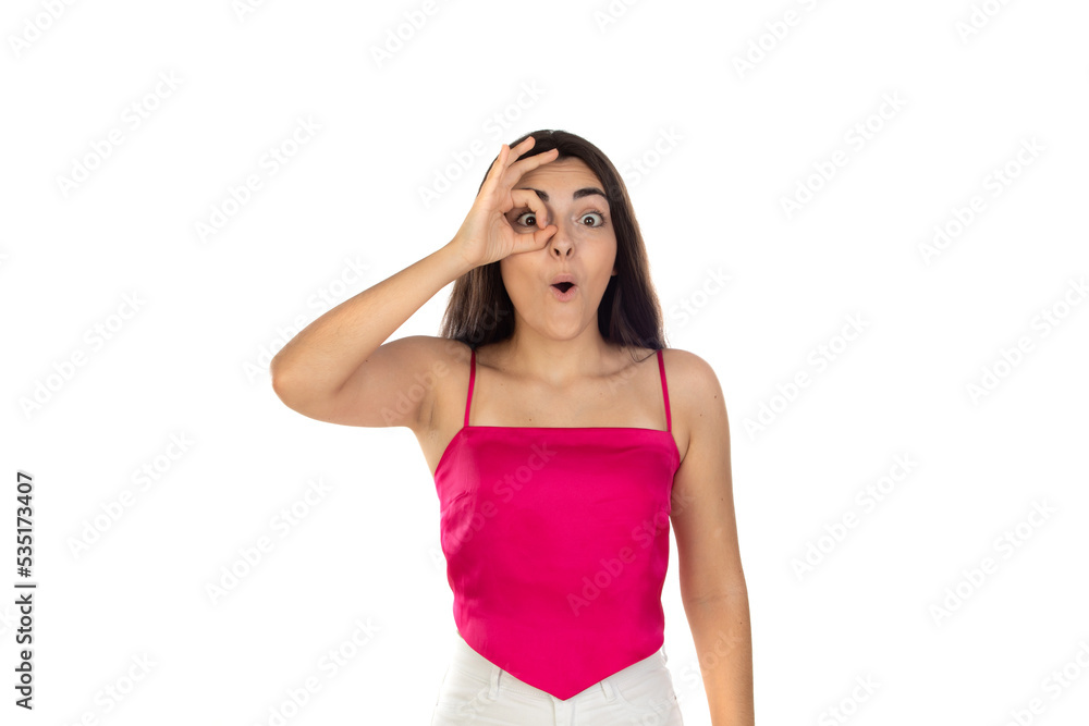Brunette surprised woman looking through her fingers Brunette surprised woman looking through her fingers