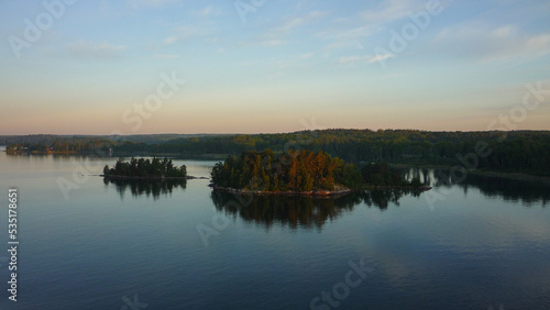 View from outdoor deck of cruiseship cruise ship liner sailing through Stockholm archipelago islands during sunrise twilight early morning hour blue hour nature landscape scenery beauty Baltic cruisin
