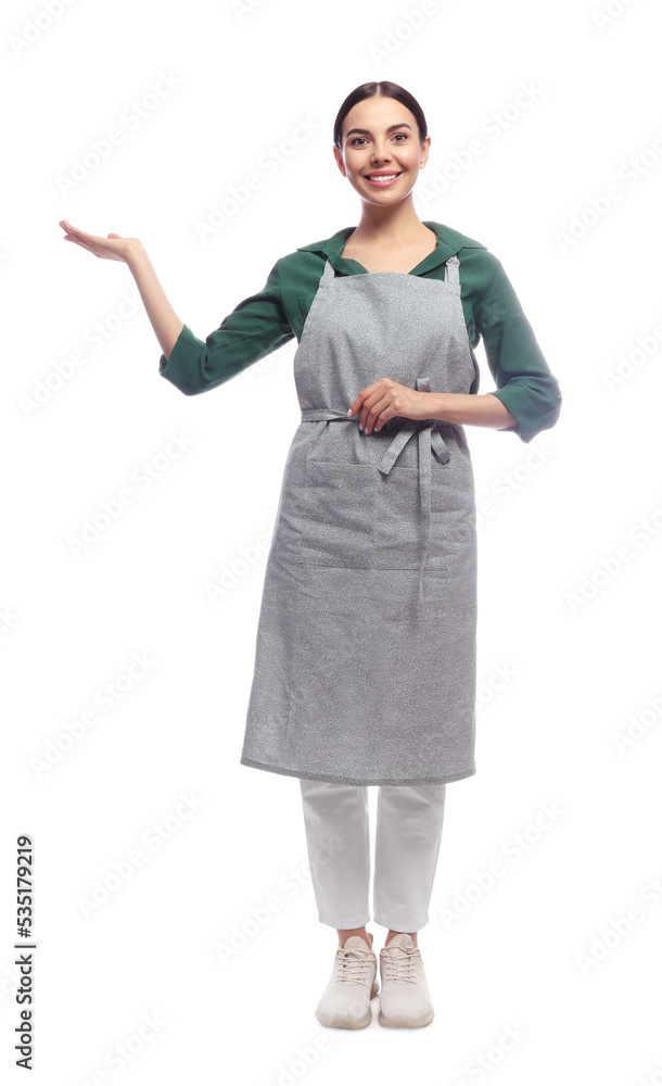 Young woman in grey apron on white background Young woman in grey apron on white background
