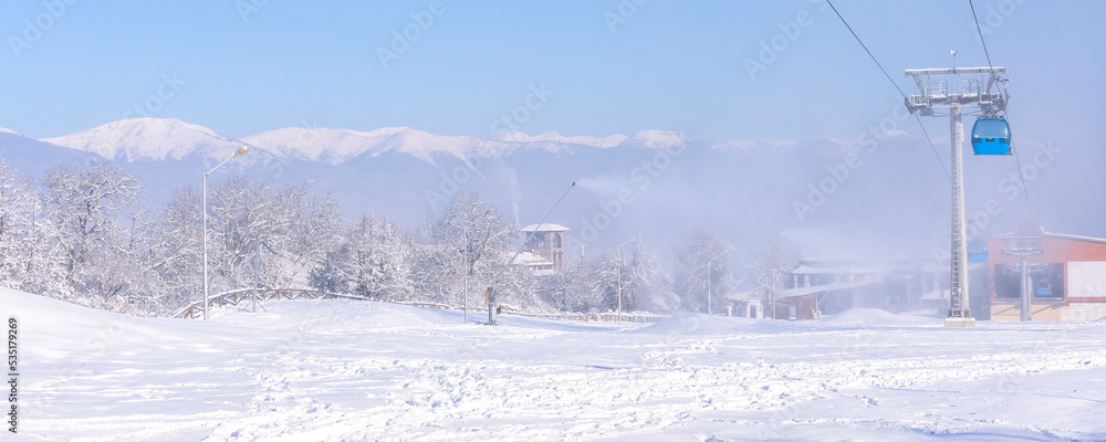 Ski resort Bansko, Bulgaria, cable car and slope Ski resort Bansko, Bulgaria, cable car and slope