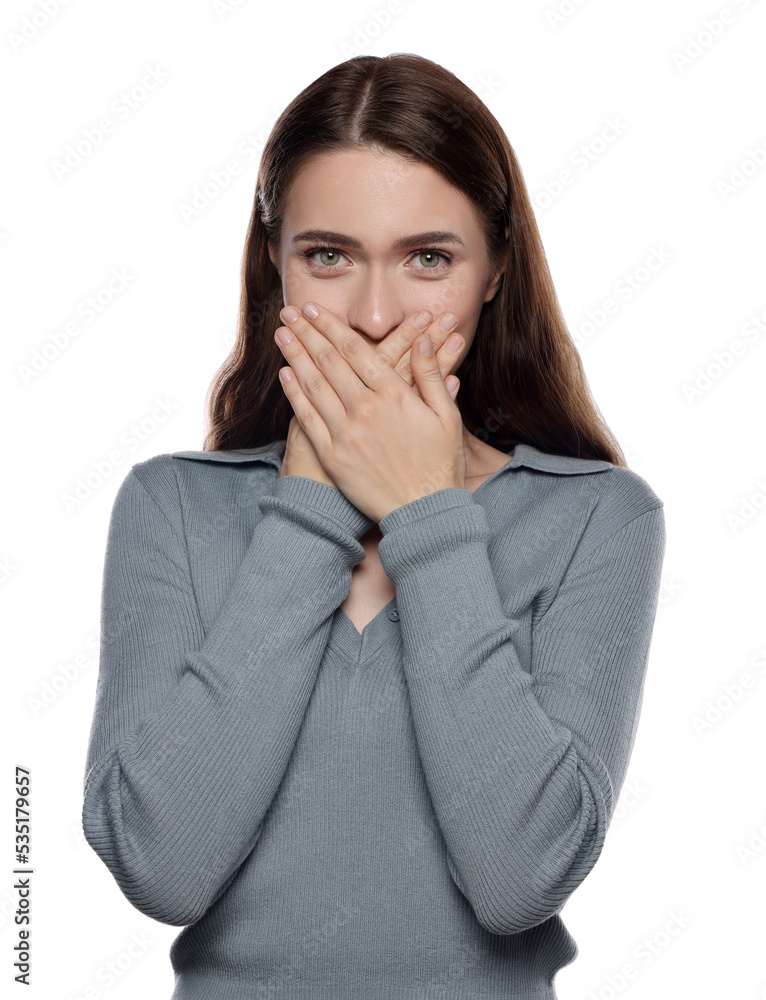 Embarrassed young woman covering face with hands on white background Embarrassed young woman covering face with hands on white background