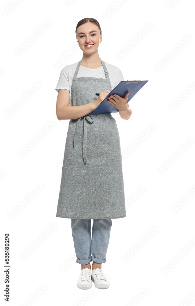 Beautiful young woman in clean apron with clipboard on white background Beautiful young woman in clean apron with clipboard on white background