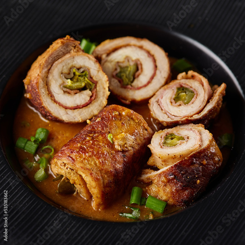 Pork roulade with pickles and bacon, served with demiglace meat sauce