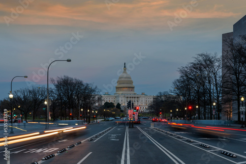 Capitol Building from Pennsylvania Avenue in the evening with sunset sky