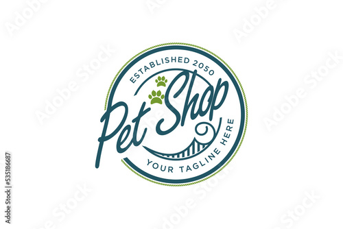 Pet shop logo design circular shape paw animal footprints icon symbol typography style