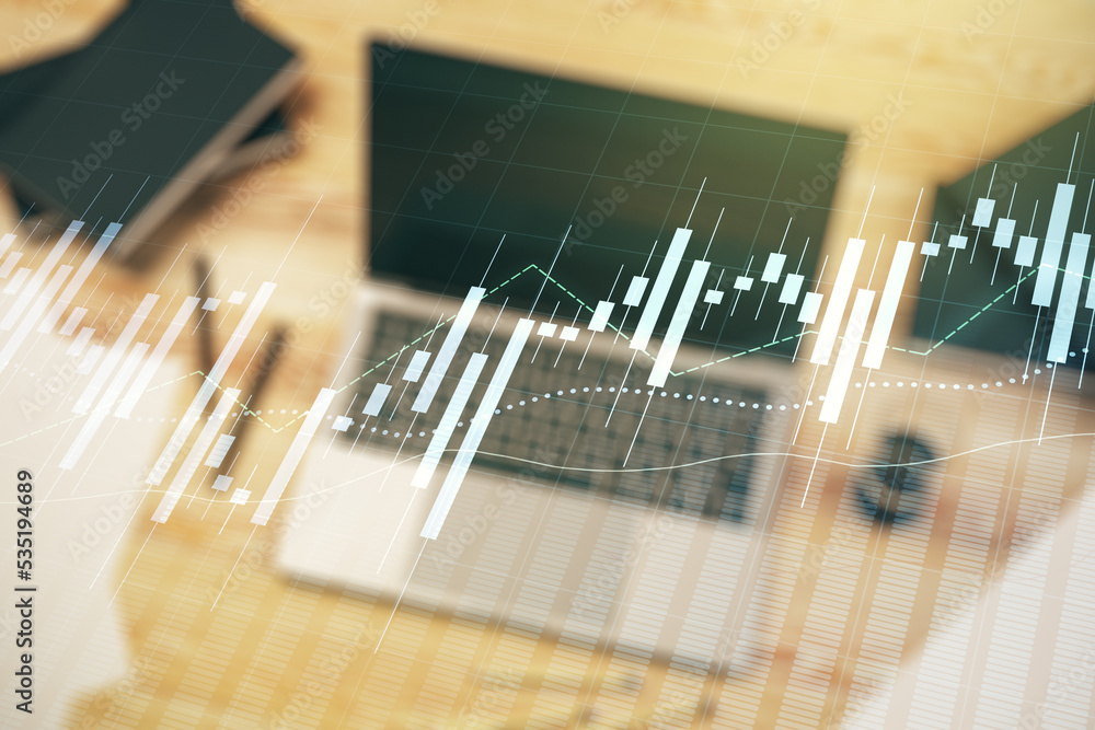 Multi exposure of abstract creative financial chart on computer background, research and analytics concept Multi exposure of abstract creative financial chart on computer background, research and analytics concept