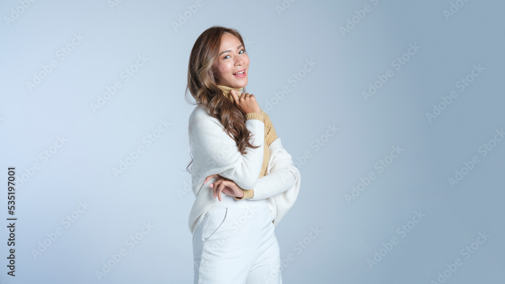 Portrait of beautiful woman in warm blouse for autumn or winter standing on white background. Portrait of beautiful woman in warm blouse for autumn or winter standing on white background.