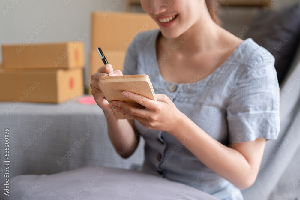 Asian small business owner working at home office. Business retail market and online sell marketing delivery, SME e-commerce concept Asian small business owner working at home office. Business retail market and online sell marketing delivery, SME e-commerce concept