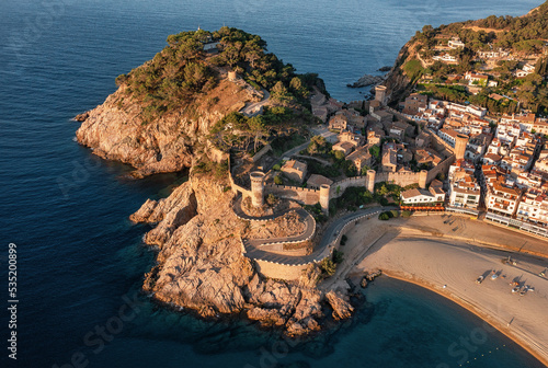 Aerial view to beautiful fortress and beach in Lloret de Mar on Costa Brava, Spain photo
