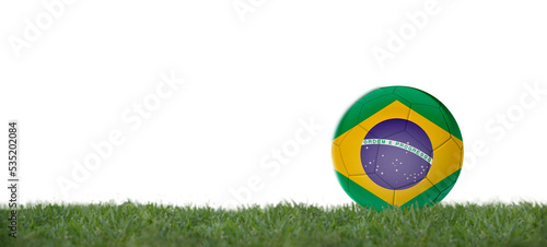 Soccer ball with brazil flag on grass  copy space with white background.