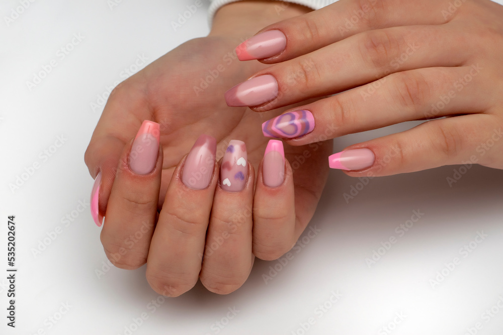 Pink beige french manicure on long square nails with painted hearts