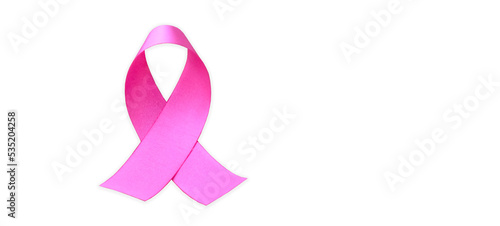 Isolated pink ribbon, symbol of female breast cancer awareness campaign in Ocotober, with clipping paths. photo